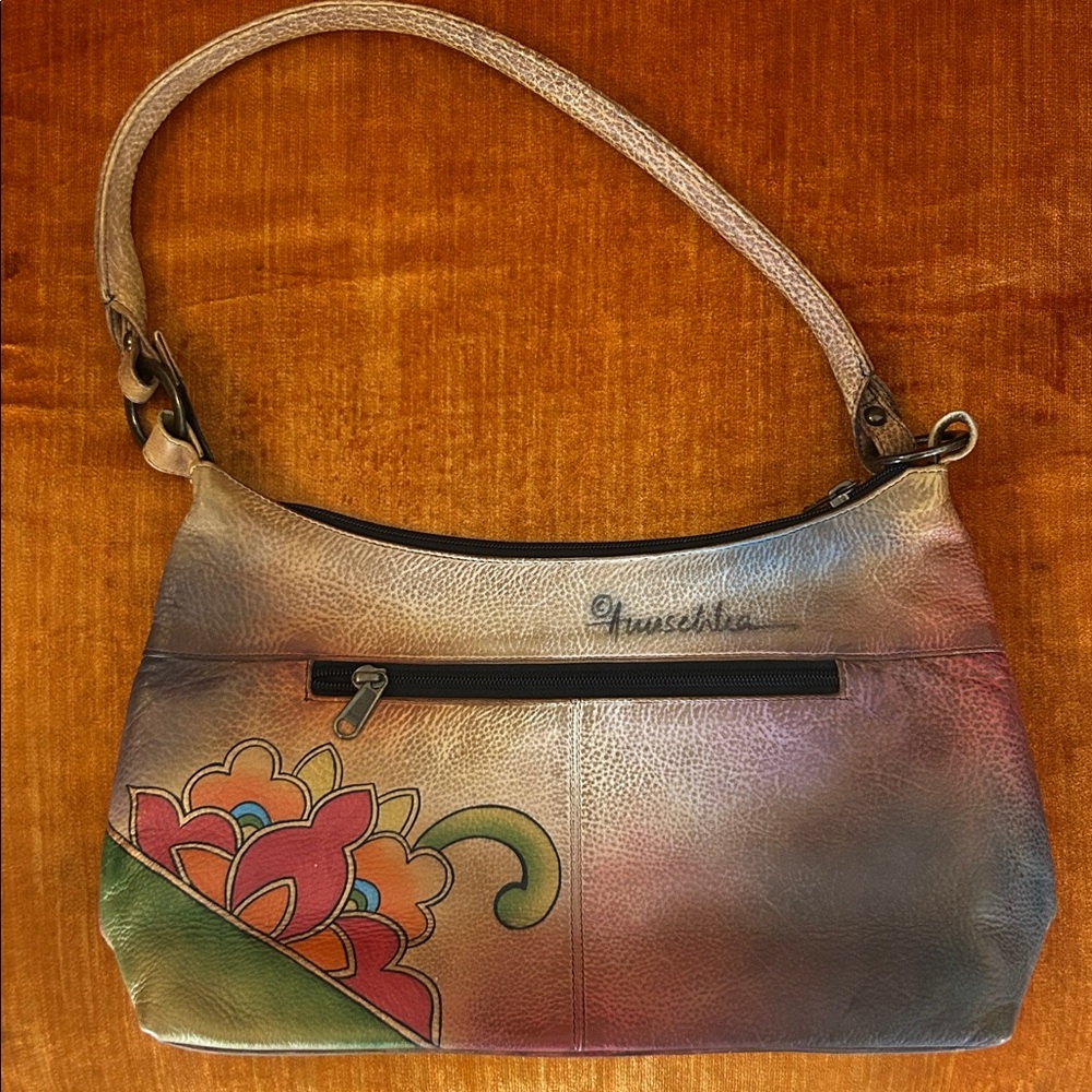 Anuschka hand-painted genuine leather bag featuring floral lotus artwork. - Picture 3 of 12